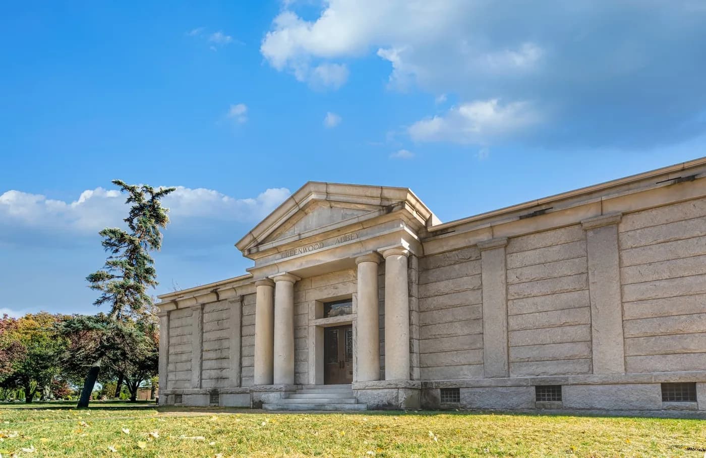 The classical stone mausoleum at Greenwood Cemetery.